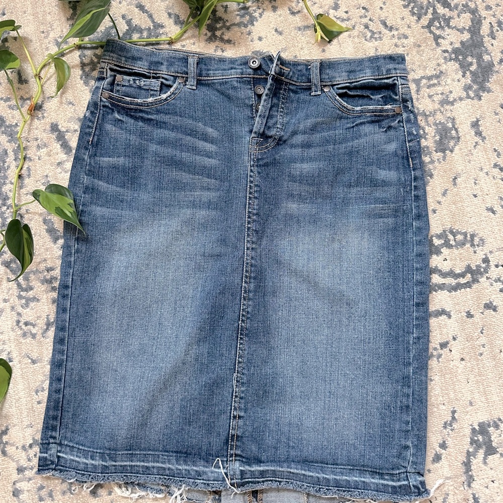 Distressed denim knee length skirt